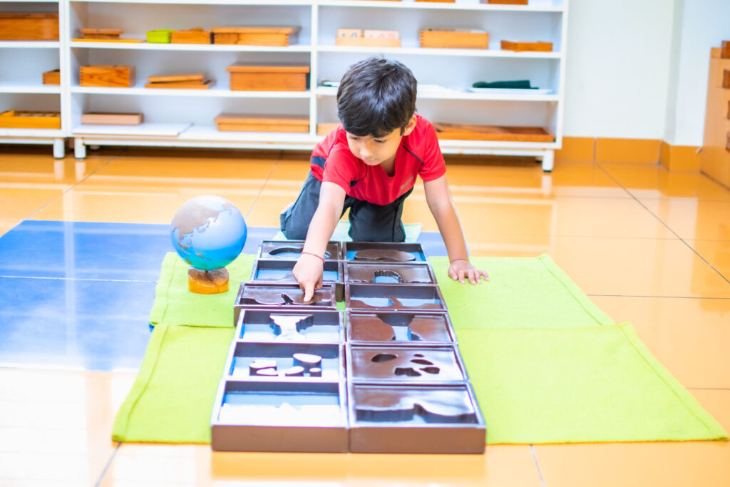 kids learning and playing with wooden blocks at cherubs
