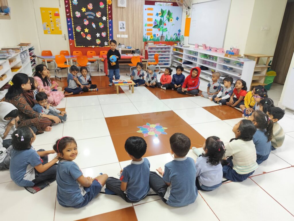 Children participating in a Montessori circle time activity