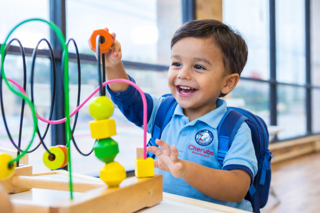 Preschool child enjoying Montessori learning activity indoors