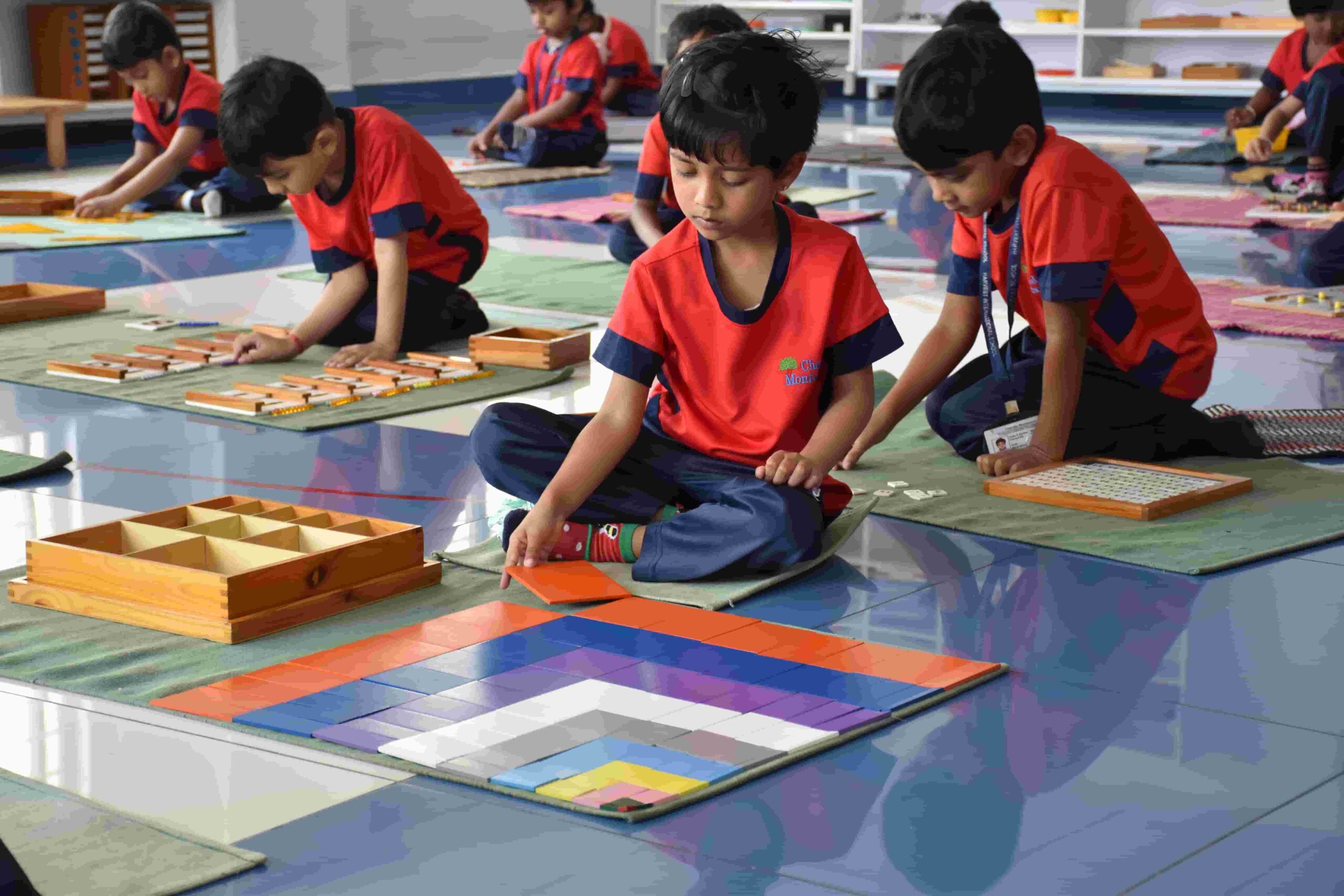 Children participating in a classroom activity at Cherubs Montessori