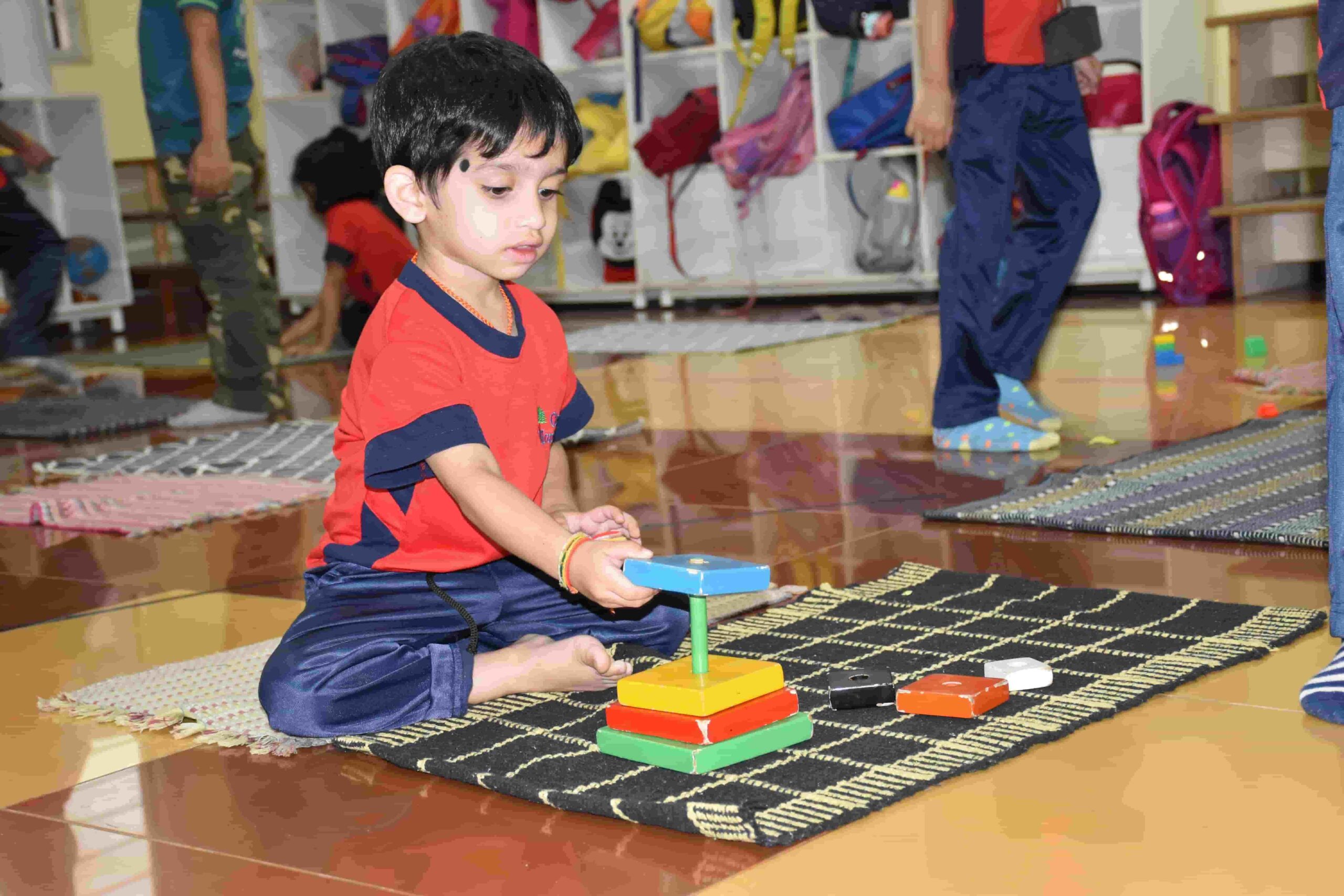 Children learning numbers using Montessori materials